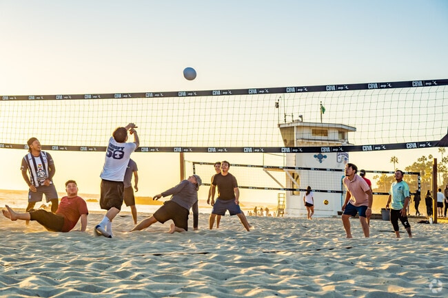 Beach volleyball is the sport of choice in the warm sands of Laguna Beach.