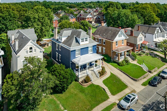 Well manicured lawns and two story homes in a quiet Saint Bernard neighborhood.
