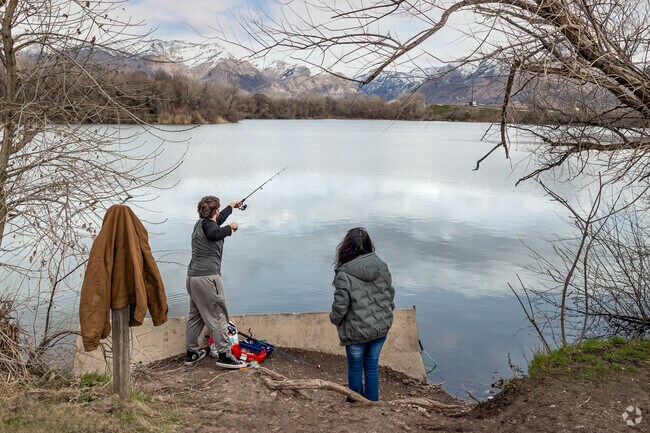 West Haven residents fish at Twenty-First Street Pond.