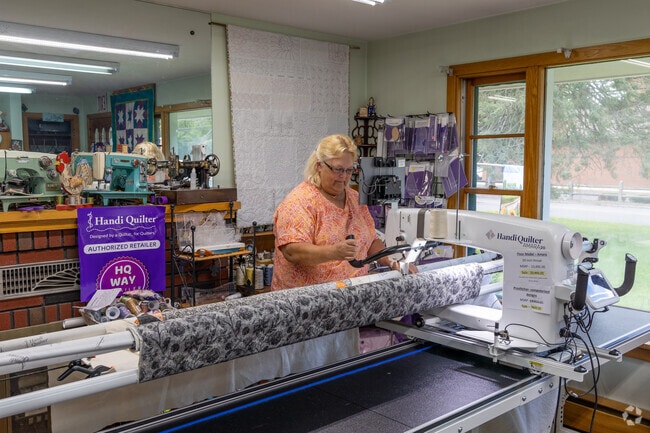 Connie's Collectibles and Quilt Shop offers custom quilts with a smile.