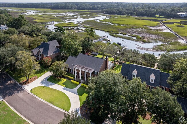 Colonial homes in Longpoint overlook scenic marsh views.