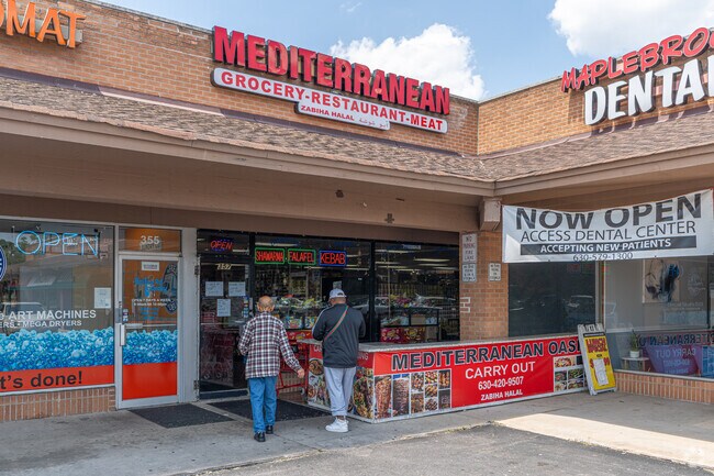 Locals shop for groceries at Mediterranean Oasis Mart located near Winding Creek Estates.