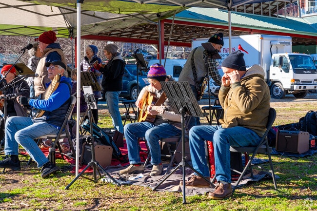Live music at the Durham Farmers' Market in the Central Park neighborhood.