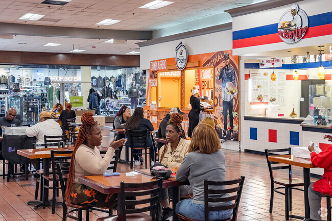 The Food Court at Greenbriar Mall boasts a vibrant selection of local eateries, each offering a unique taste of the community's culinary culture.