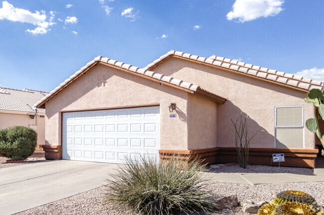 Desert landscaping and stucco exteriors define Acacia Trails’ home style.