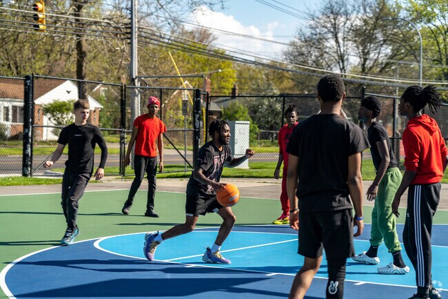 During the summer, residents of Sherwood gather at Farwell Park for outdoor basketball games