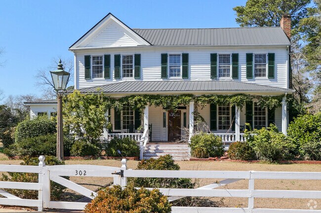 Historic colonial homes like this one in Clinton's West Main-North Chesnutt Streets Historic District are common in the downtown area.