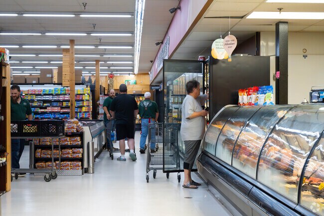 Shoppers pick up groceries at Shadik’s.