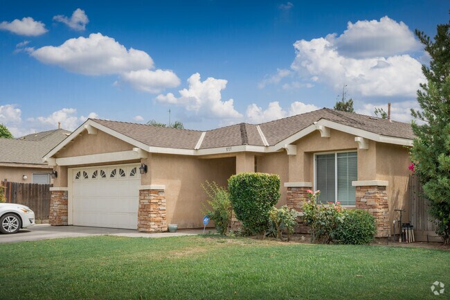 Earth-toned stucco and stone siding seen on a home in Venola.