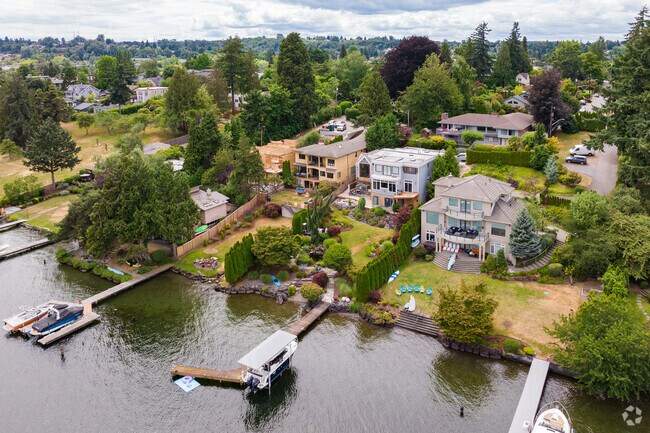 Lakeside homes with private docks line Lake Washington near Dunlap.