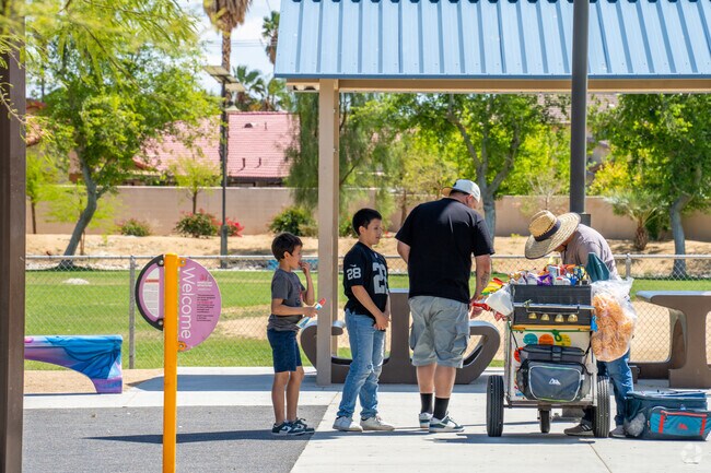 Children cool off with tasty ice cream at Ocotillo Park in Whitewater, Palm Springs.