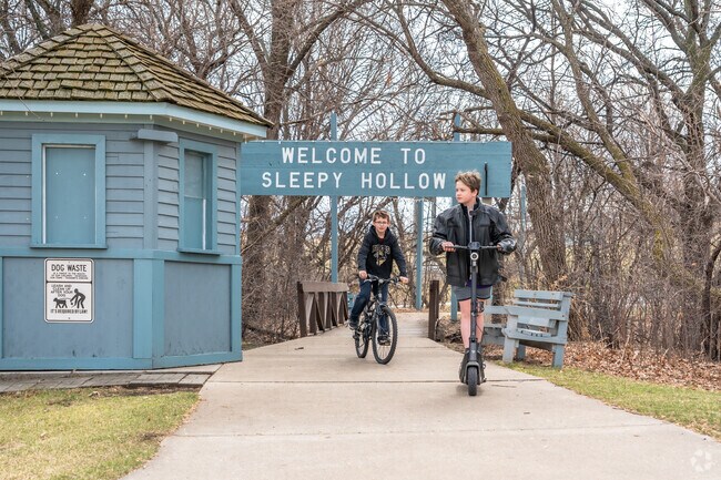 Hillside North children enjoy riding the paved walkways at Sleepy Hollow Theatre and Arts Park.