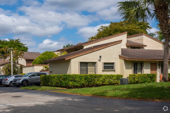 Row of townhomes with terracotta roofs near the Falls Mall.