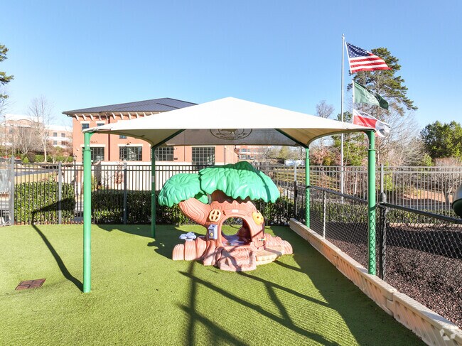 Kids enjoy playground time at Primrose School of Cornelius.