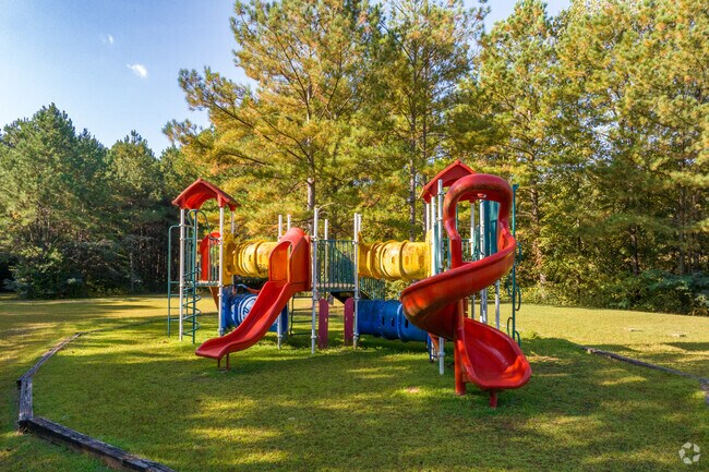 Play on the Playground at Forestdale Community Park.