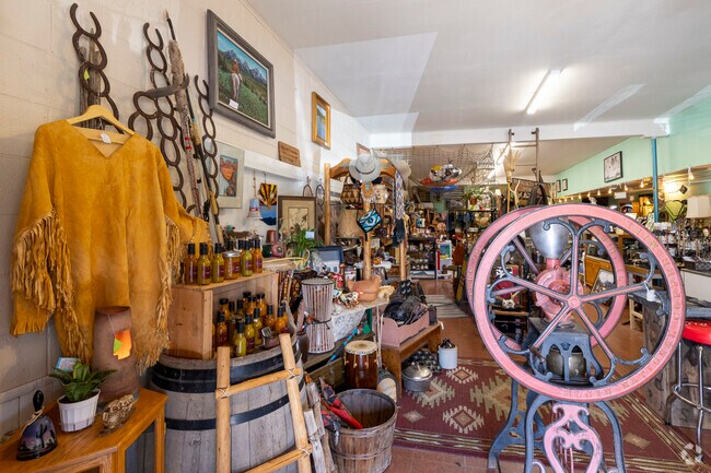 Find unique items at Cattle Guard Antiques and Gifts near Lake Montezuma, by the cattle guard.