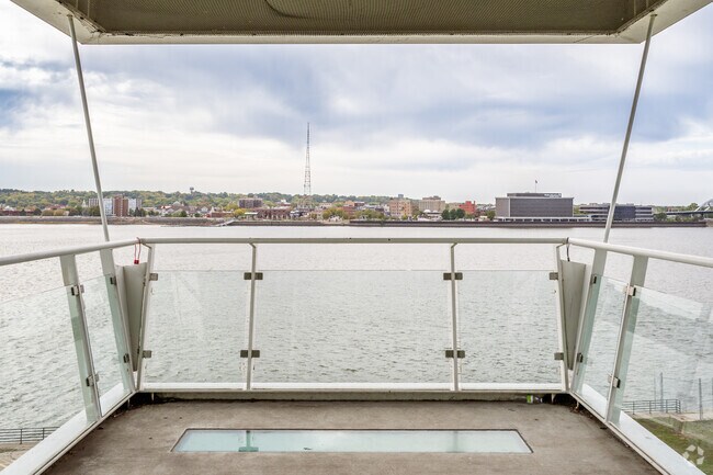 Experience Davenport's best: Riverside picnics at LeClaire Park and evenings under the SkyBridge