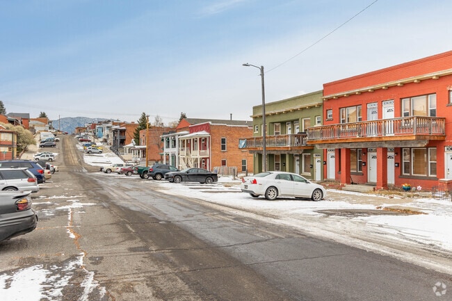 You can find multi-family homes along West Park Street's quieter residential streets.