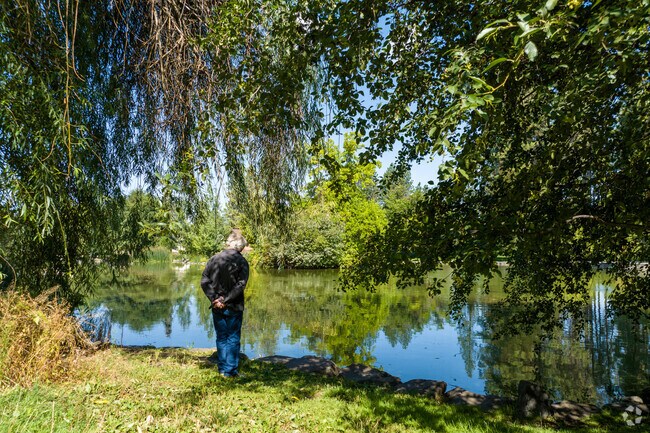 Spokane locals enjoy nice walks in the park.