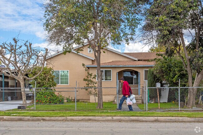 Sidewalks serve to provide easy walks to the grocery store in Calwa.
