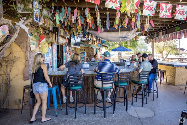 Locals gather at Taco Shack’s outdoor bar on South Sossaman Road.