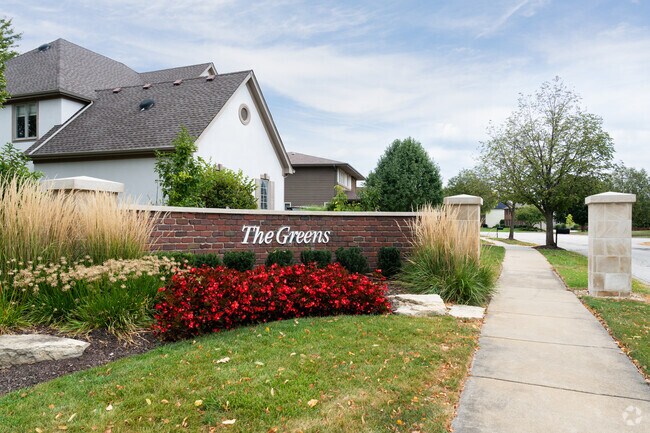 Beautiful grasses and flowers in bloom greet the residents of Eola Yards.