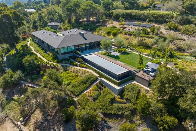 Contemporary hillside estates in Woodside Hills offer expansive views and elegant architecture.