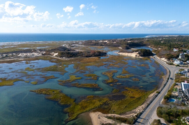 Wetlands stretch toward the Atlantic beyond Provincetown’s coastal roads.
