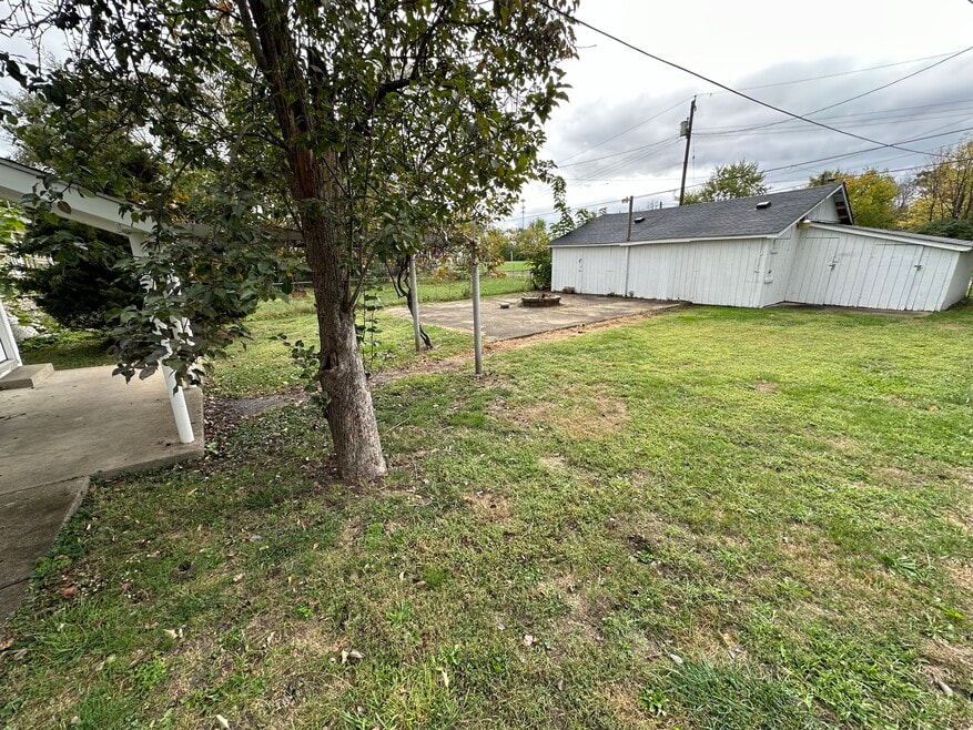 Shared back yard space with storage unit
