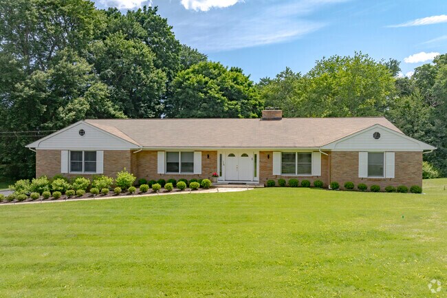 A standout ranch-style home in Glenville provides ample curb appeal.