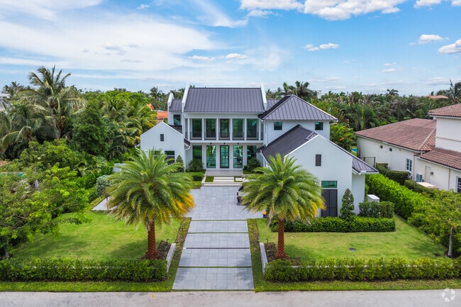 Experience unparalleled luxury in a beautiful Mansion home in Downtown Boynton.