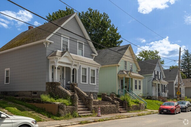Colorful Queen Anne homes line May Street in Centralville, Lowell.