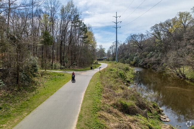 Many residents of Quail Hollow enjoy walking along the Little Sugar Creek Greenway.