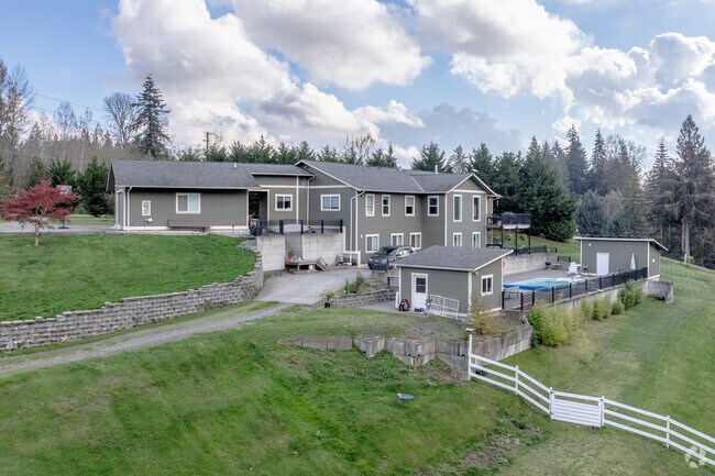 Create lasting memories in this inviting Alger property.