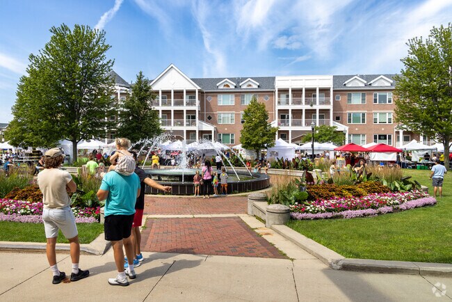 Enjoy a the outdoors near the fountain just outside of the Kenosha Public Museum.