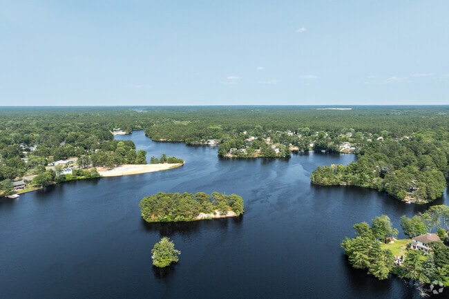 Country Lake in Browns Mills has many private homes bordering it but does offer public access at Tenshaw Drive Park.