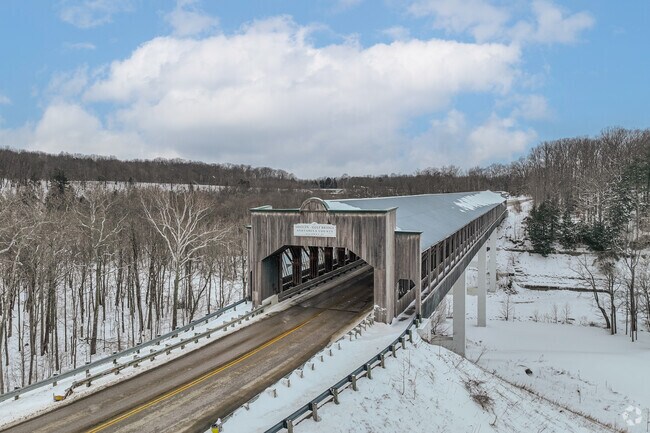 The Smolen-Gulf covered bridge crosses the Ashtabula River and offers a pedestrian connection to Indian Trails park.