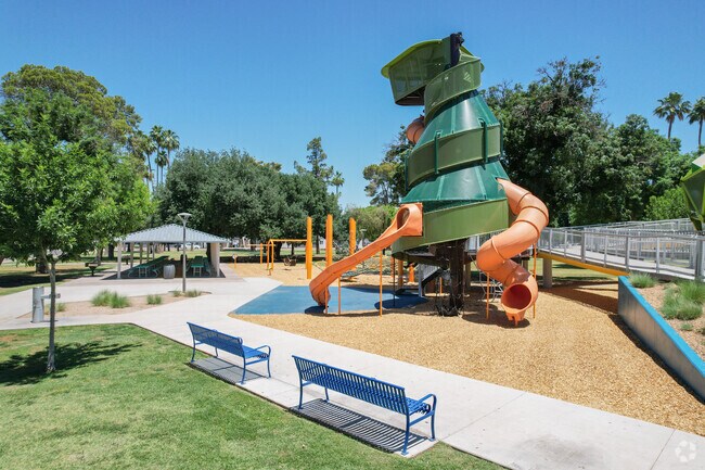 Kids love playing on the unique play structure at Pioneer Park.