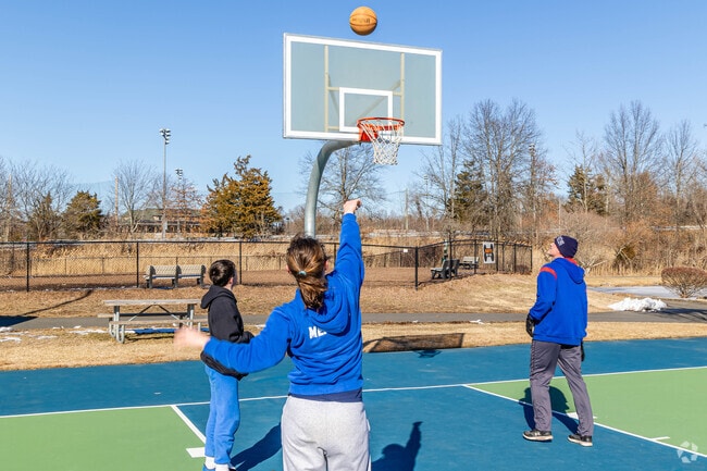The cold weather does not keep residents from enjoying Pearl River Park's facilities such as the basketball court.
