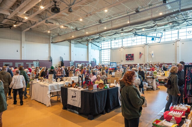 Vendors pack the Cape Cod Tech's gym to spread the holiday joy.