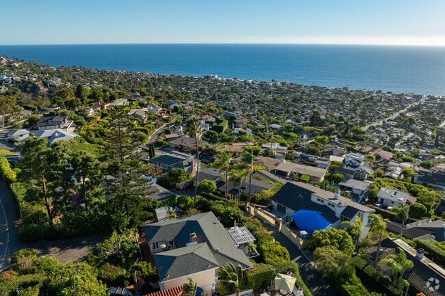 Temple Hills showcases a mix of homes with panoramic Pacific Ocean views.