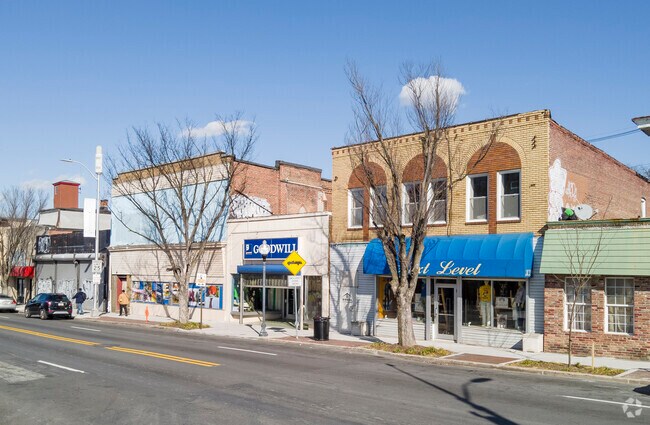Small stores line Greenmount Avenue in the Barclay neighborhood.