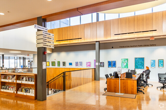 Visit the Needham Free Public Library to enjoy the beautiful space while you browse.