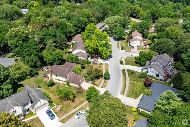 The Olentangy Highlands neighborhood is situated among the lush greenery of mature trees.