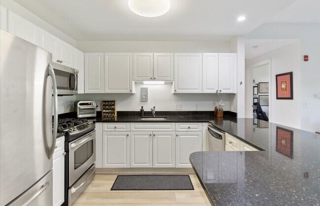 Reservoir Crossing unit 1303, Braintree, MA 02184 - photo 6