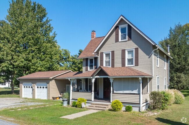 Houses in Picture Rocks often have big front porches and detached garages.