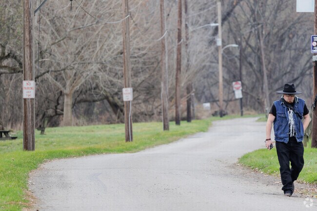 A man takes a stroll along riverside park in Tunkhannock, PA.