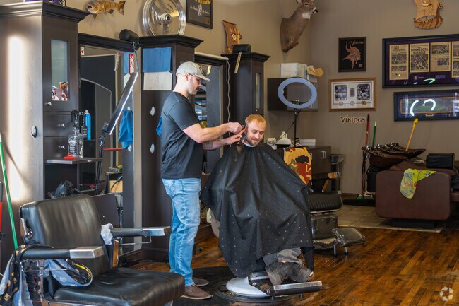 Residents aim to walk the streets with the latest hairstyles at North Branch Barbers.