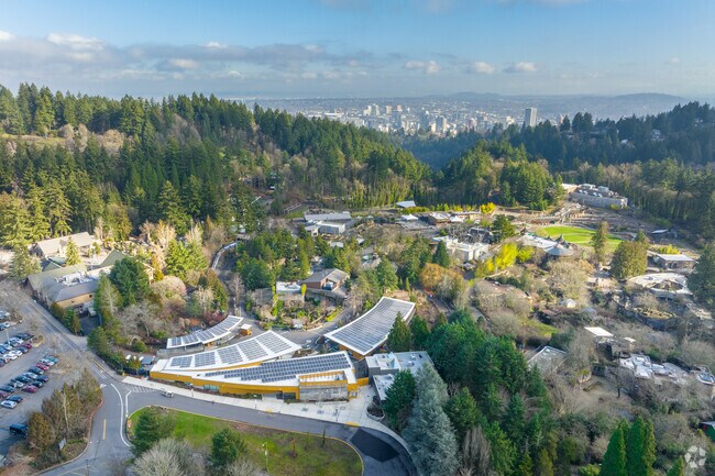Wide view of the Oregon Zoo with Downtown visible in the distance in Portland, Oregon.