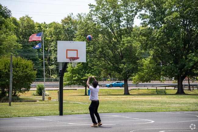 Play some basketball at Croydon Acres Park in Croydon.